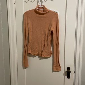 peach turtleneck size M from aritzia